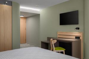 Televisor o centre d'entreteniment de flexymotel Buchs
