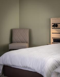 Llit o llits en una habitació de flexymotel Buchs