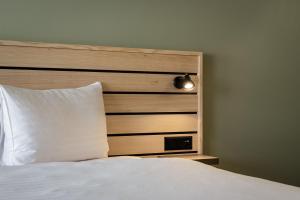 Llit o llits en una habitació de flexymotel Buchs