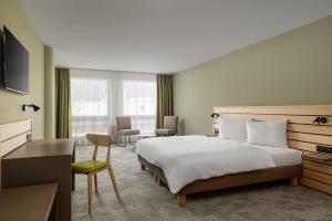 Llit o llits en una habitació de flexymotel Buchs