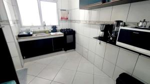 Gallery image of Apartamento - Praia das Astúrias in Guarujá +12 photos