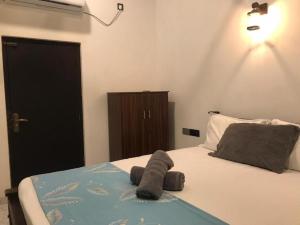 Postel nebo postele na pokoji v ubytování Villa Utopia Mirissa