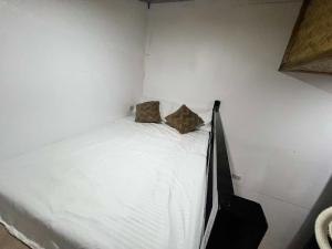 Postel nebo postele na pokoji v ubytování AA Hostel