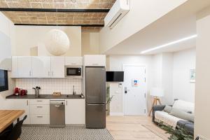 Kuchyňa alebo kuchynka v ubytovaní Barcelona Touch Apartments - Campalans