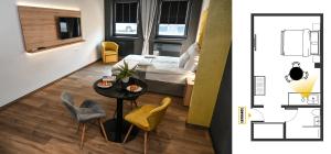 Posteľ alebo postele v izbe v ubytovaní Zafír Apartman Sárvár