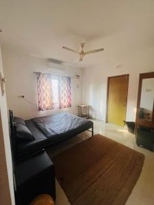 Ένα ή περισσότερα κρεβάτια σε δωμάτιο στο NA BnB