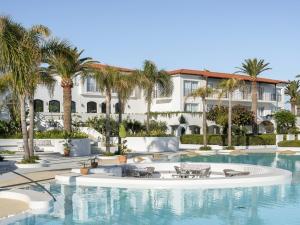 The swimming pool at or close to Caramel, A Grecotel Resort to Live