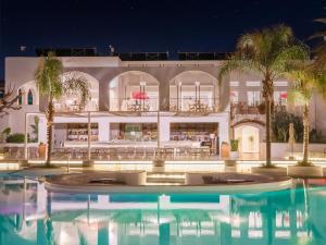 The swimming pool at or close to Caramel, A Grecotel Resort to Live