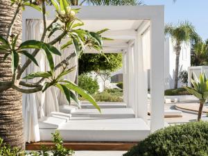 A garden outside Caramel, A Grecotel Resort to Live