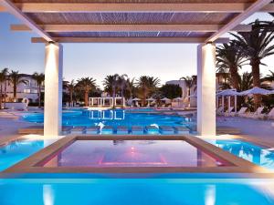 The swimming pool at or close to Caramel, A Grecotel Resort to Live