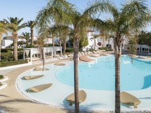 The swimming pool at or close to Caramel, A Grecotel Resort to Live