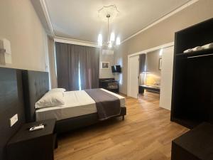 Voodi või voodid majutusasutuse Sunset Guest House toas