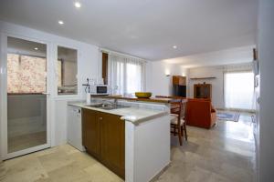a kitchen with a sink and a counter at La Recoleta ID198 in Cabo Roig