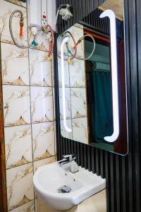 Vannituba majutusasutuses T-Square Residence Makepe