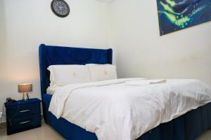 Voodi või voodid majutusasutuse T-Square Residence Makepe toas