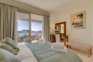 Postel nebo postele na pokoji v ubytování Burgau Penthouse