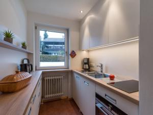 Kuchyň nebo kuchyňský kout v ubytování Ferienwohnanlage Oberaudorf F3 mit Hallenbad und Sauna