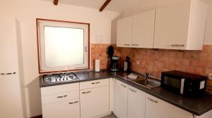 Η κουζίνα ή μικρή κουζίνα στο Chalet 1004