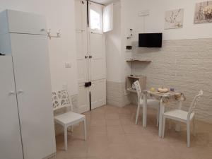 Η κουζίνα ή μικρή κουζίνα στο Baglieri appartament +21 φωτογραφίες