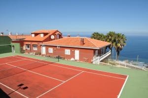 Tenis alebo squash v ubytovaní Vivienda Vacacional Paseo Mirabal alebo jeho okolí