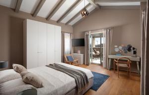 Postel nebo postele na pokoji v ubytování Villa Corinne