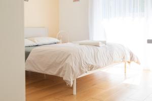 Postel nebo postele na pokoji v ubytování Elegant Suites Murten