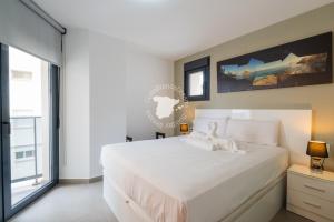 Posteľ alebo postele v izbe v ubytovaní CostaBlancaDreams Bernia al Mar in Calpe