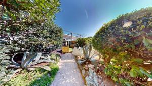 Zahrada ubytování Villa Désir Village Naturiste Jardin et Jacuzzi