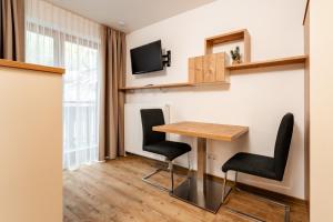 Telewizja i/lub zestaw kina domowego w obiekcie Gästehaus Nemast