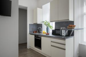 Kuchyň nebo kuchyňský kout v ubytování Enjoy Downtown Boutique Apartments #12 by Goodnite cz