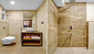 范兰德凡Hotel Light House Urban Silverkey -Free unlimited 5g internet, in house parking- Fully AC - Near Prem Mandir的带淋浴、马桶和水槽的浴室