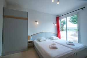 Postel nebo postele na pokoji v ubytování Domaine de l'Espinet + 37 fotografií