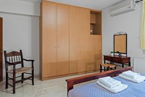 Кровать или кровати в номере Liakoto Stonewall House Groundfloor