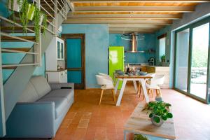 a living room with a couch and a table at Ca da la Butina in Mergozzo +30 photos