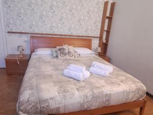 Postel nebo postele na pokoji v ubytování Delizioso appartamento in corte