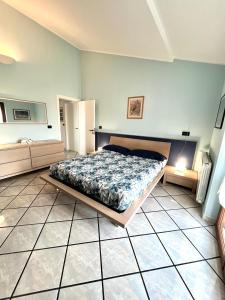 a bedroom with a bed in a room at Miramare - WelcHome in Fossacesia