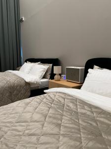 Postel nebo postele na pokoji v ubytování Ocean View Suite