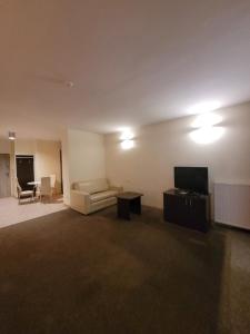 Telewizja i/lub zestaw kina domowego w obiekcie Artel Villa Tarsis