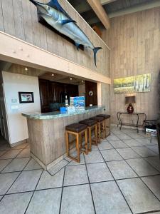 a restaurant with a bar with a shark on the wall at LLC1236 - Lakeside Landing condo in South Lake Tahoe