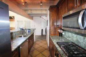 a large kitchen with a sink and a stove at LLC1236 - Lakeside Landing in South Lake Tahoe +27 photos