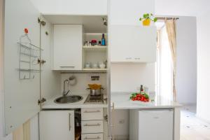 Dapur atau dapur kecil di AntonelloApartments - La casa del pozzo