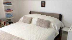 A bed or beds in a room at Rita-Vár Szálláshely
