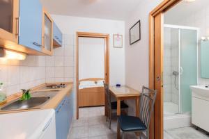 Koupelna v ubytování Apartments Marija 1921 + 30 fotografií