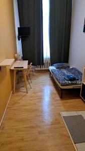 Postel nebo postele na pokoji v ubytování U Szermierzy