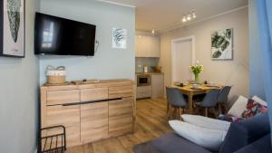 Η κουζίνα ή μικρή κουζίνα στο Apartamenty Dębowe