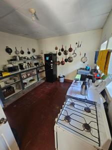 Kuchyň nebo kuchyňský kout v ubytování Casa 25 hostal santa ana