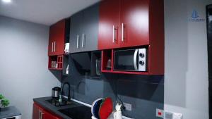 Kuchyň nebo kuchyňský kout v ubytování Riviera Apartment