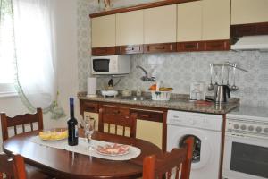Kuchyňa alebo kuchynka v ubytovaní Vivienda Vacacional Paseo Mirabal