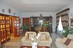 Posedenie v ubytovaní Vivienda Vacacional Paseo Mirabal