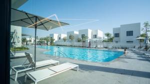 an image of a swimming pool at a resort at Luxury Villa In Yas in Abu Dhabi